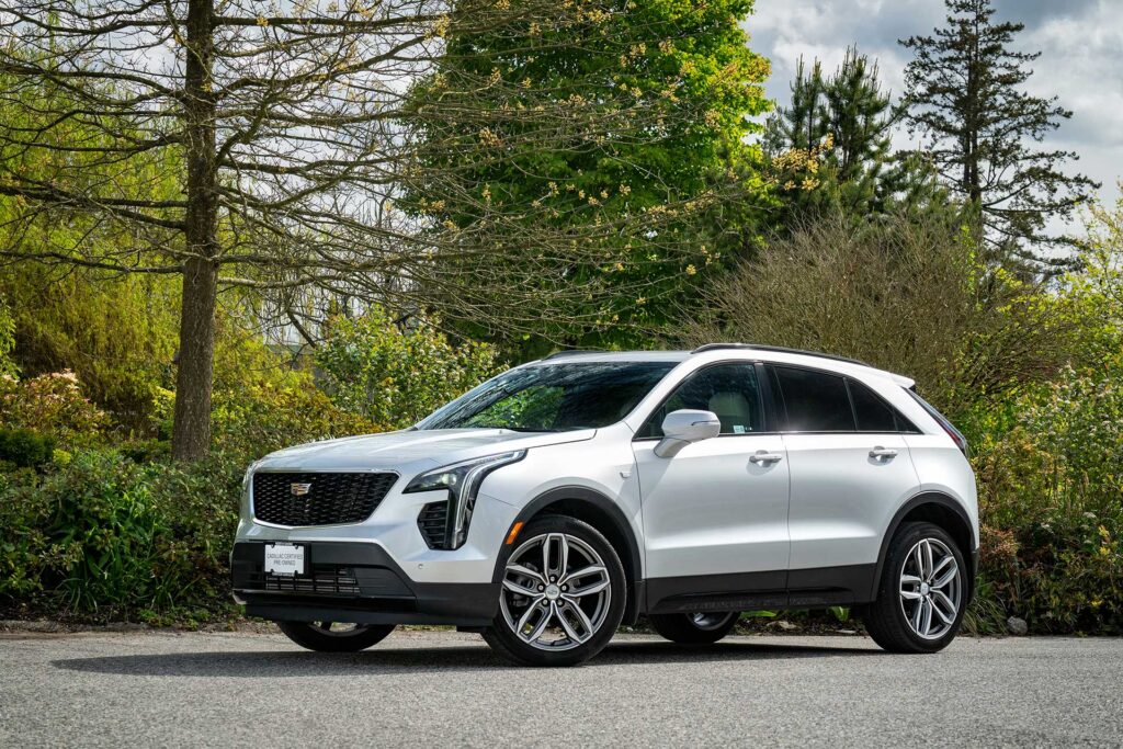 Cadillac with glossy ceramic coating finish parked outdoors.