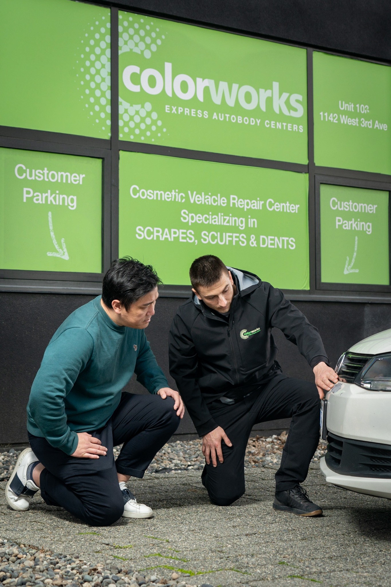 Colorworks advisor reviewing bumper damage for a private auto body repair estimate