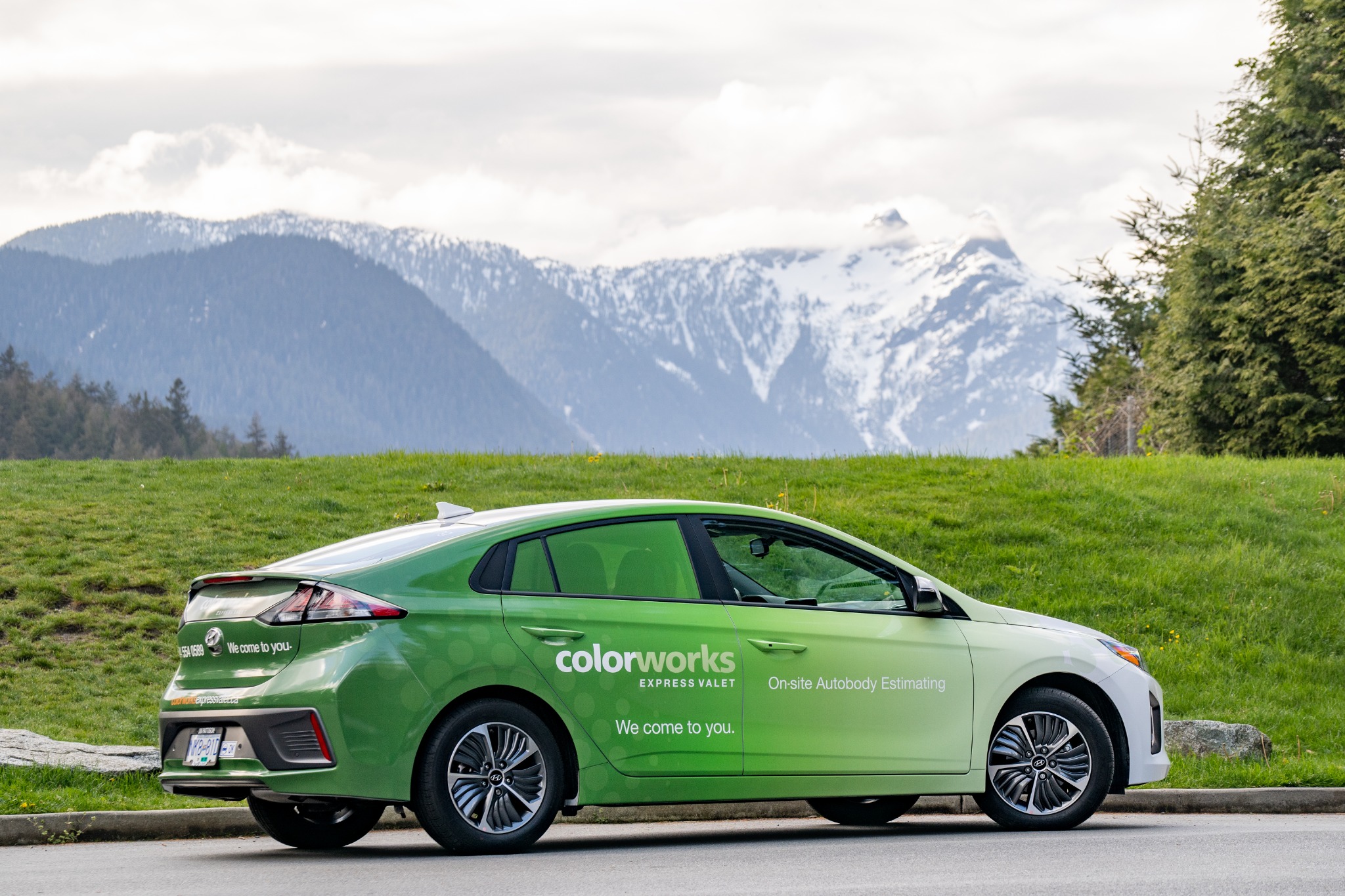 Colorworks ICBC Valet service Toyota Prius parked with a mountain backdrop